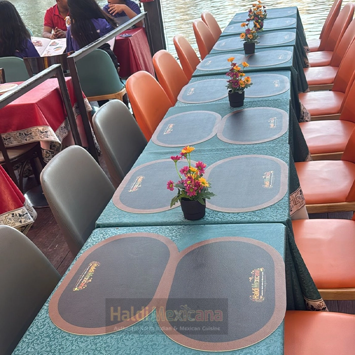 Elegant indoor dining setup at north indian restaurant singapore with warm lighting